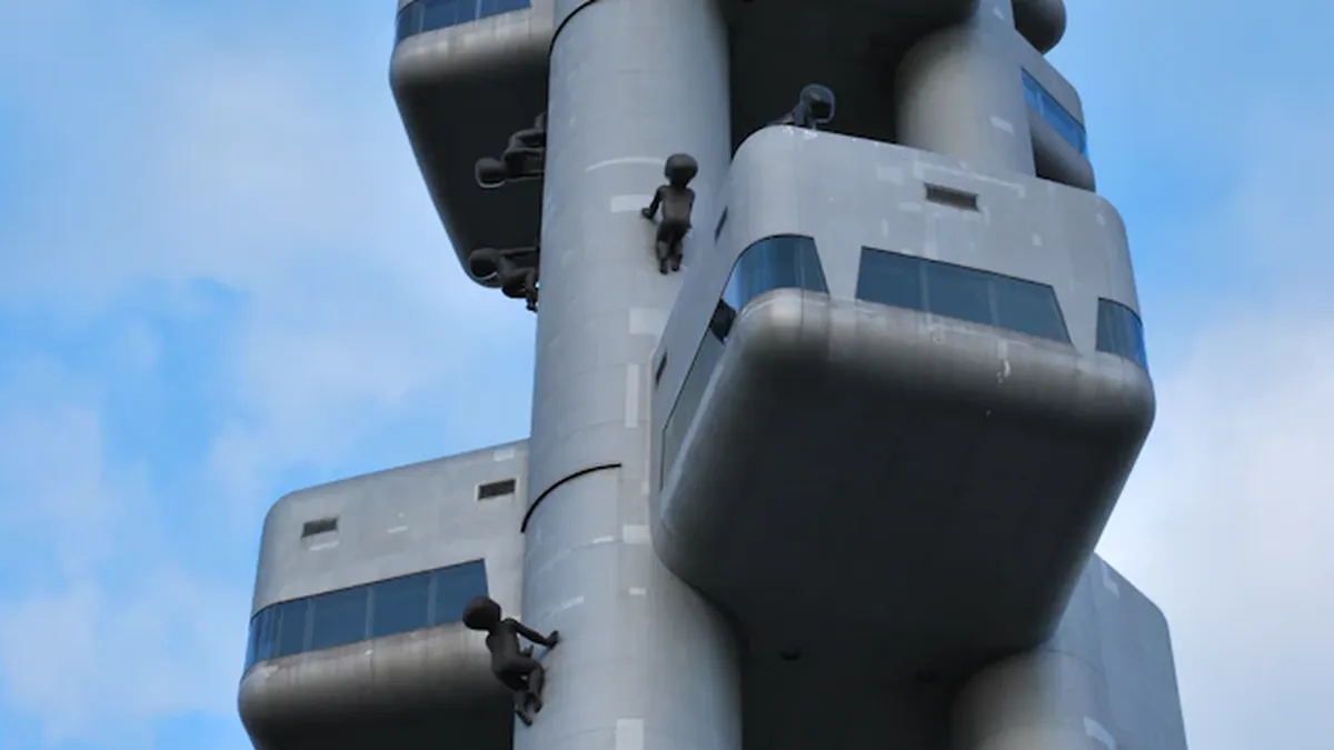 Large military radar installation with protective dome structure against cloudy sky