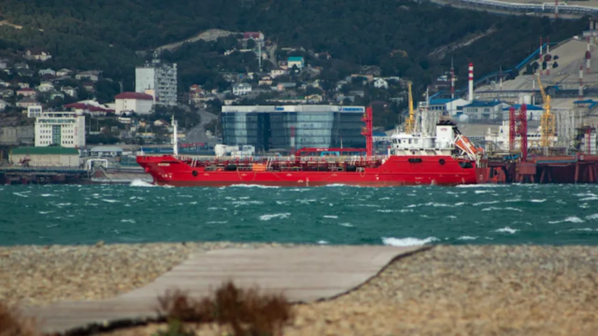 Commercial cargo vessel navigating through the strategic Red Sea shipping lane