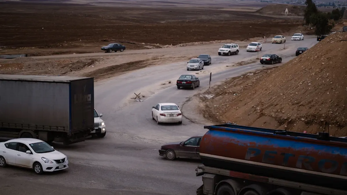 Iraqi oil tanker trucks crossing al-Waleed border into Syria 2026