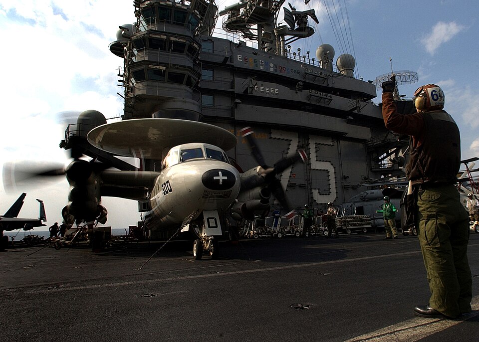 US Navy aircraft carrier in Persian Gulf waters near Strait of Hormuz 2026